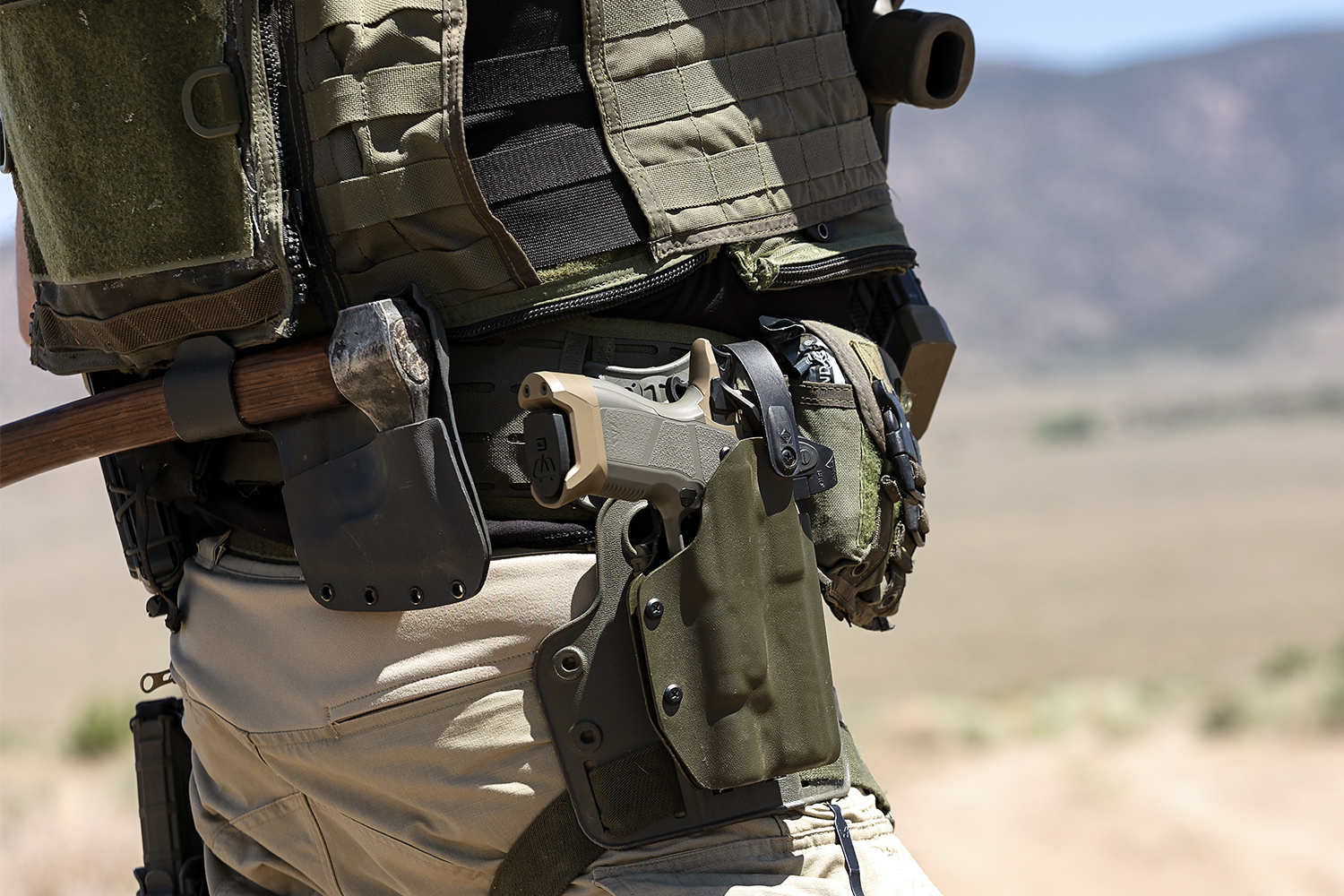 OA Defense OA 2311 High Desert holstered in the desert